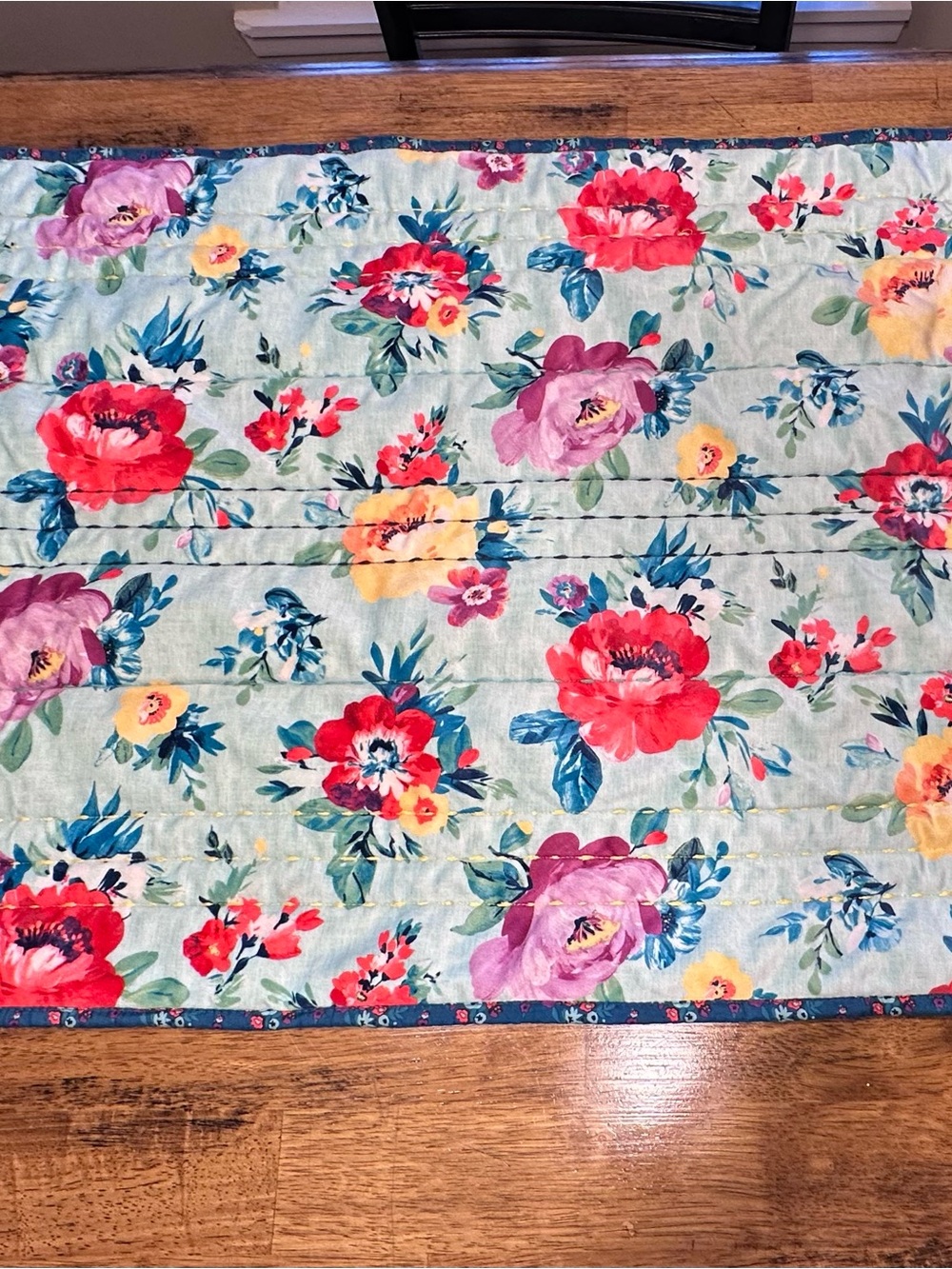 King Floral Quilted Pillow Sham in Light Blue with Multicolor Blooms